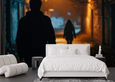 Man following woman in dark street, night, stalking, crime, mugger, scary worry violence, city danger silhouette life footsteps two people girl man, afraid. Wall mural