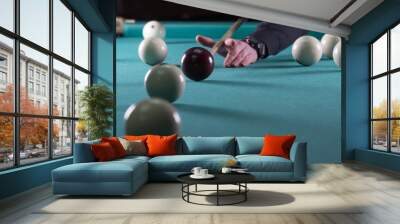 play billiards. cue and billiard balls. hammer the ball into the hole. Wall mural