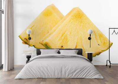 two sliced pineapple wedges on white isolated background Wall mural