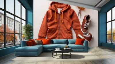 Stylish terracotta children's autumn jacket with sneakers Wall mural