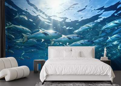 School of fish swimming under water of sea Wall mural