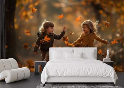 Two children playing in the fall, one in a yellow jacket Wall mural