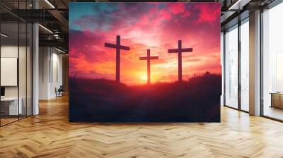 three crosses on a hill, bathed in the warm light of a setting sun Wall mural