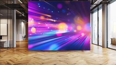 A mesmerizing display of light beams reflecting vibrant colors across a dark background, creating a stunning rainbow effect. The blurred and dynamic motion of the lights adds an ab Wall mural