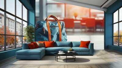 Packing a bag for work or school, morning routine, blurred background, with copy space Wall mural