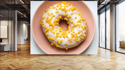 Tasty white donut with yellow round sprinkles. Background, texture. Close up. Macro Wall mural