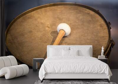 Closeup shot of old war drum with drumstick Wall mural