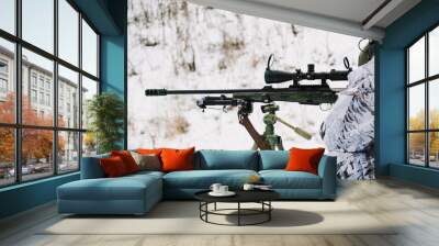 A sniper aims from a tripod in a white mask Wall mural