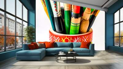 colorful cup filled with lots of different types of pens and pencils. Wall mural