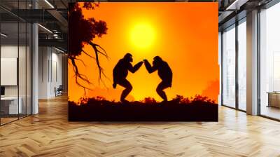 Two silhouettes of man and woman dancing in front of sunset. Generative AI. Wall mural