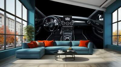 Luxury car interior. Steering wheel, shift lever and dashboard. black leather interior with black dashboard. on an isolated black background Wall mural