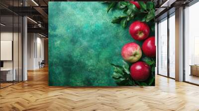 Sukkot celebration background with apples and greenery for festive design Wall mural