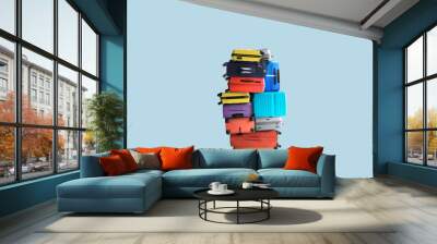 Tourist suitcases stacked on top of each other in a pile. Travel concept. Wall mural