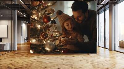 Father and daughter decorating Christmas tree together Wall mural