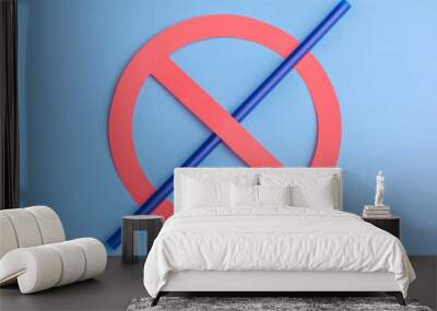 No plastic. Small blue straw in prohibition sign over a blue background, showing a sign of no plastic straw due to its effect on environment. Copy space for text. Wall mural