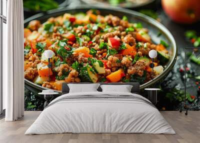 A bowl of food with meat and vegetables. The bowl is on a wooden table Wall mural