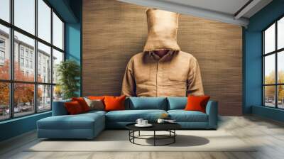 A mysterious portrait depicting a man with a paper bag on his head, evoking a kidnapping concept. A dramatic and intriguing image for various themes. Wall mural