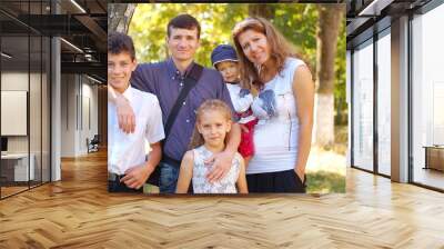 Happy family on the nature in the summer Wall mural