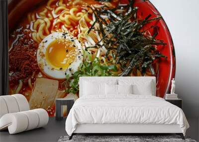 closeup red bowl of delicious ramen with kimchi on a white table, tasty traditional asian noodle soup top view Wall mural