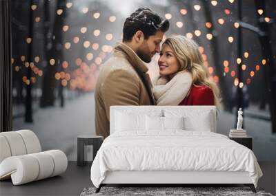 Couple in love hugging in a winter park on a blurred garland background Wall mural