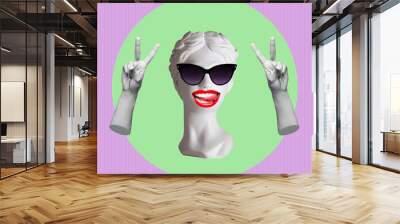 Antique female statue in black sunglasses shows a peace gesture with hands and tongue on green and purple color background. Trendy collage in magazine surreal style. 3d contemporary art. Modern design Wall mural