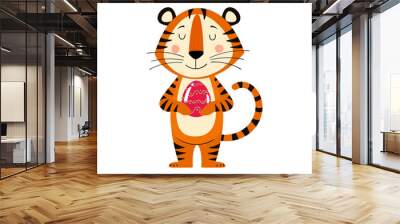 Cute cartoon striped red tiger. A tiger is holding an Easter egg. Printing for children's T-shirts, greeting cards, posters. Hand-drawn vector stock illustration isolated on a white Wall mural