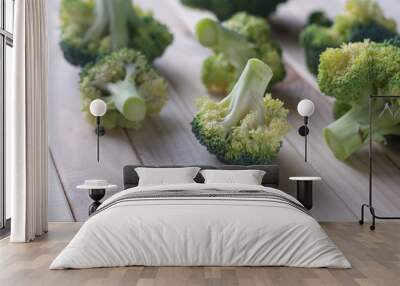 green healthy broccoli on light wood Wall mural