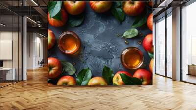 Fresh apples and honey in jars, surrounded by green leaves, symbolizing natural sweetness and harvest, suitable for healthy eating and organic food themes. Wall mural