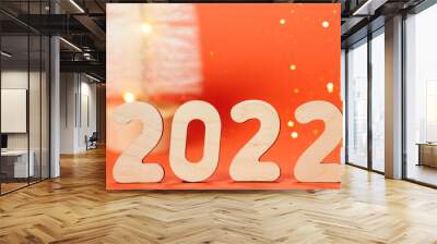 The number 2022 on a shiny red background Wall mural