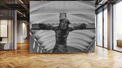 Jesus Christ crucified. An ancient wooden sculpture details Wall mural