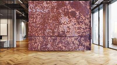 two sheets of rusty metal welded together lie on each other. Wall mural