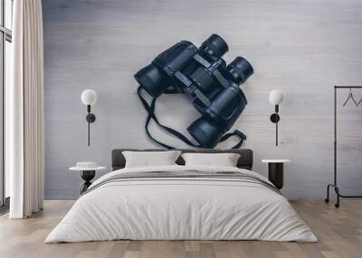 Binoculars on the table Wall mural