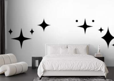 Set of shining vector icons. Sparkle and flash signs. Glow star icons. Black shiny effect. Clean symbol. Bright glitter sign. Wall mural