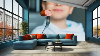 boy and mini sausage for breakfast Wall mural