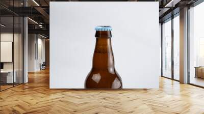 closed beer bottles on a white and black background Wall mural