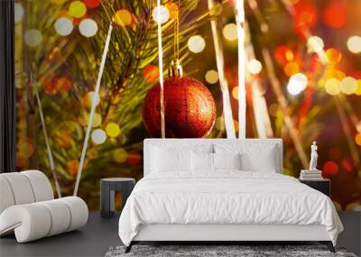 A ball on a pine tree in bright lights Wall mural