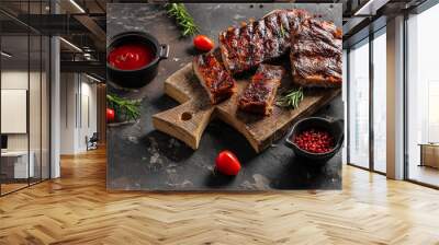 Barbecue pork spare ribs on a dark background. American Spare Ribs in BBQ Sauce. Restaurant menu, dieting, cookbook recipe top view Wall mural