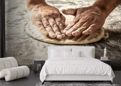 Chef hands cooking dough on dark wooden background. Man preparing bread dough. Food concept Wall mural