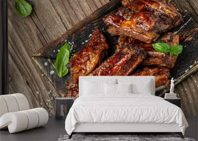 Grilled pork ribs on a wooden cutting board. banner, menu, recipe place for text, top view Wall mural