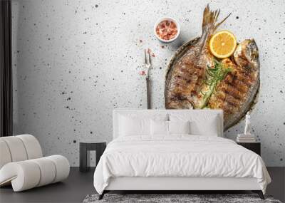 grilled whole fish dorado on a light background. Concept healthy and balanced eating. place for text, top view Wall mural