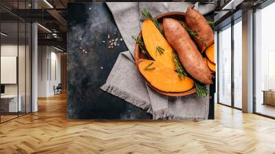 organic orange sweet potato. raw sweet potatoes or batatas. vegan food ingredient. banner, menu, rec Wall mural