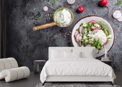 Radish salad in bowl with cottage cheese and arugula with sour cream. Detox and healthy superfoods bowl concept Wall mural