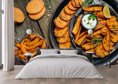 Set of homemade baked sweet potato fries with lime and herbs. banner, menu, recipe place for text, top view Wall mural