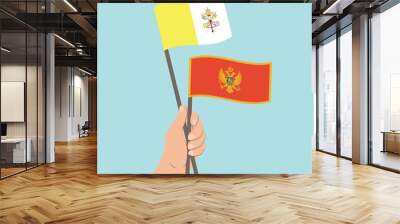 Flags of Vatican City and Montenegro, Hand Holding flags Wall mural