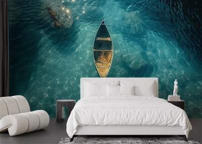 Artistic overhead view of a lone canoe on water Wall mural