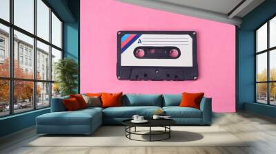 Audio retro vintage cassette tape 80s style on pink background Wall mural