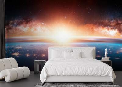 A breathtaking view of a sunrise over Earth from space highlighting cosmic beauty Wall mural