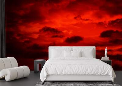 Bright red sunset. Dramatic evening sky with clouds. Fiery skies with space for design. Magic fantasy sky. War, battle, terror, world apocalypse, horror concept. Wall mural