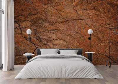 red brown rock texture. cracked mountain surface. close-up. stone background with space for design. Wall mural