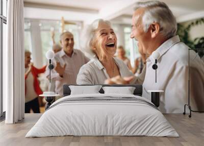 An elderly couple is dancing at a house party in an apartment for elderly friends, smiling and enjoying chatting with friends. Time for the elderly. Wall mural